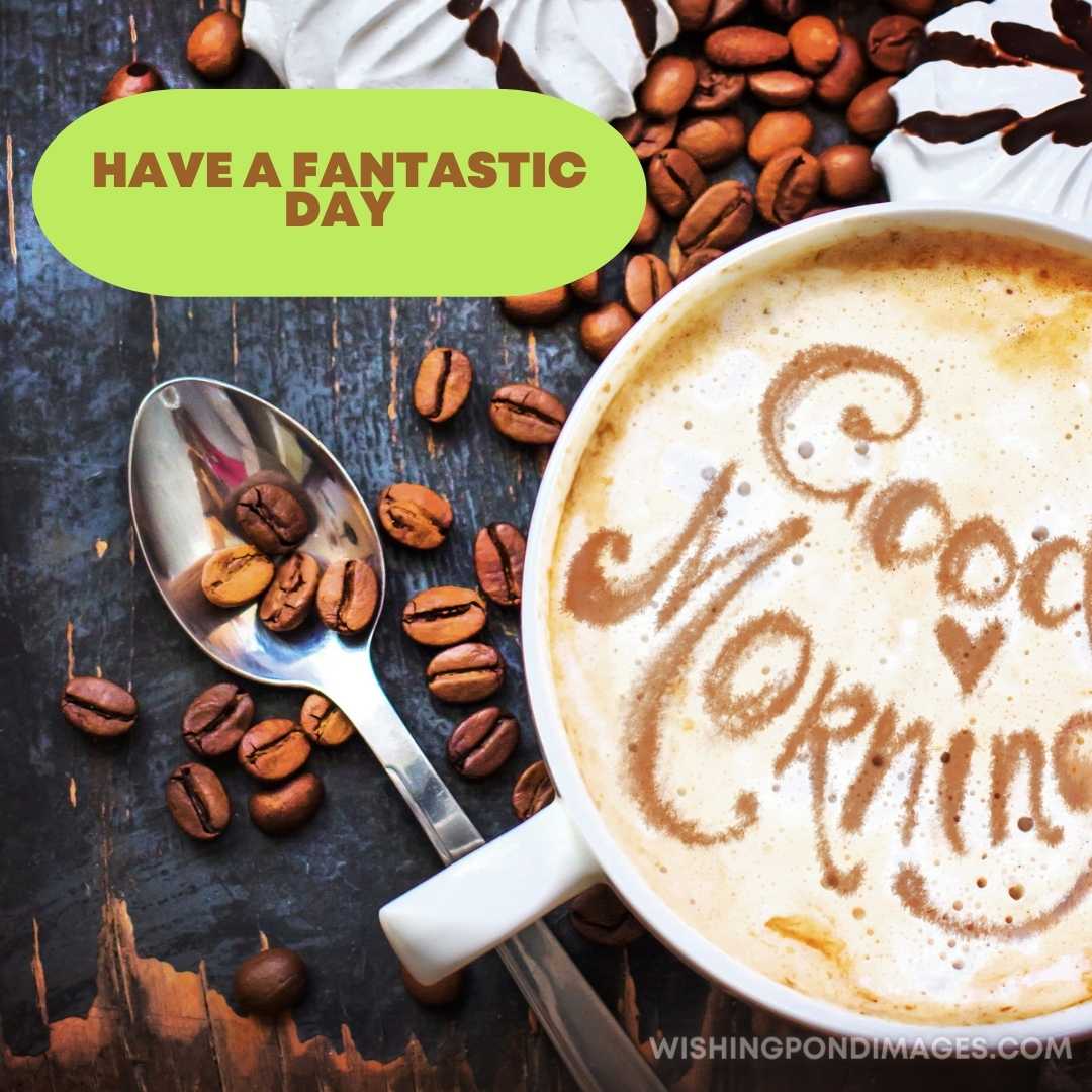 Cup of coffee with spoon and coffee beans on the table. Good Morning Coffee Images